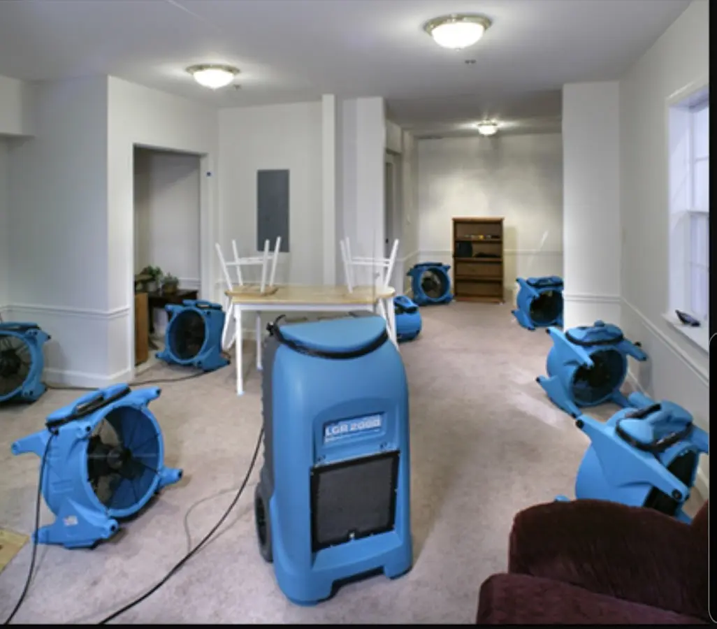 Air movers and dehumidifier setup for Water Extraction & Removal in Tecumseh